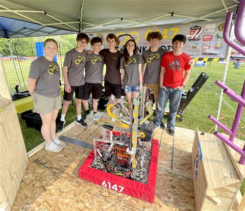  Robotics team members at Tommy's Speedwalk